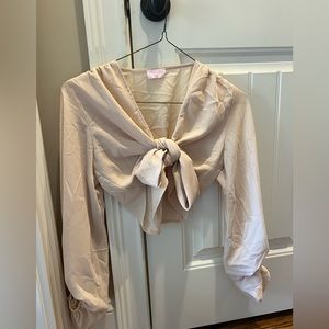 Tan blouse form pink lily